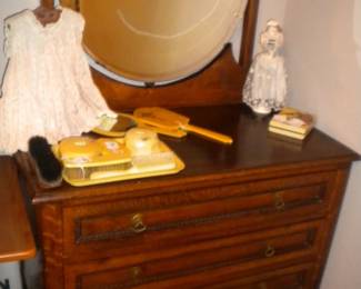 Antique dresser with swivel mirror