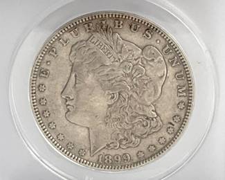 1899 Morgan Dollar ANACS AU 50 Cleaned