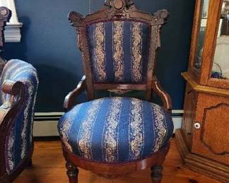 Victorian Parlor set – Walnut, turned legs, carved crest with medallion in center, scrolled ears, Circa 1860. Love seat, side chair, armchair, ladies chair (and two additional chairs with a different fabric).