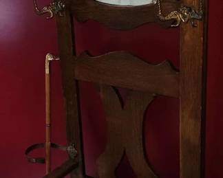 Oak hall rack – aka, Hall tree – Mirrored at top, 4 – 2 pronged metal cast (scrolled) hat rack, cupboard below, 24” w, plus umbrella holder, 74” h, Circa 1890