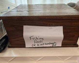 Vintage Wooden Tackle Box with Assorted Fishing Reels and Lures second image
