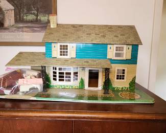 Vintage dollhouse with furniture