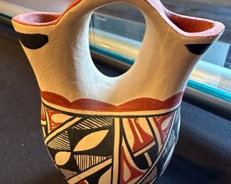 The Chinana family represents a respected line of potters from the Jemez Pueblo Signed by Alvin Chinana