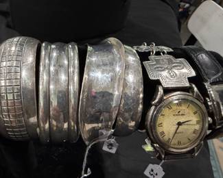 Signed Sterling Silver Cuff Bracelets and The "peyote watch" with a sterling silver band refers to a classic style of Southwestern Native American jewelry that combines fine metalsmithing with a deeply spiritual motif.