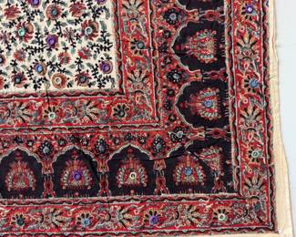 Colorful hand-embroidered Indian textile wall hanging with traditional mirror work