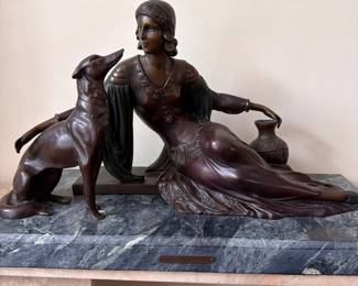woman and dog statue downtown LP