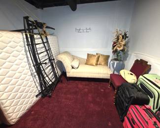 Lounging  bed, cast iron bed frame, luggage