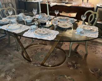Glass and gold dining table
