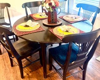 Black kitchen table with six chairs