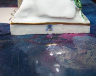 mark on base of figure
