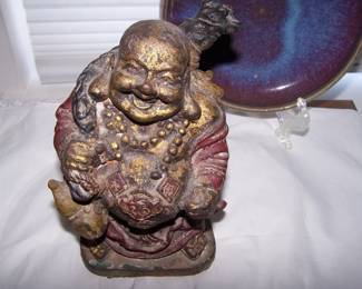 heavy heavy buddah with writing 