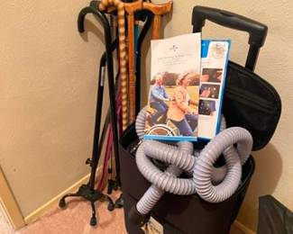 inCourage Comfort Vest (Vest therapy can help break the serious cycle of excess mucus, lung infections and further lung damage for people living with chronic respiratory conditions.) and a variety of canes..