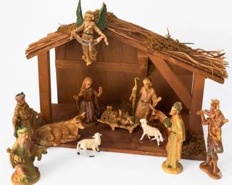 Vintage Fontanini nativity set features hand-painted resin figures and a rustic wooden stable.  Approx. 16" wide, 10" deep and 13" tall..