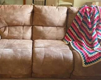 Comfortable suede recliner sofa.