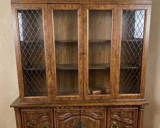 Gorgeous china cabinet (set includes a buffet, dining room table and six chairs).
