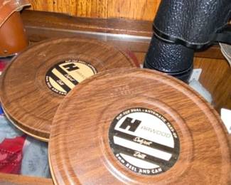 Vintage Harwood metal movie reel and canisters.