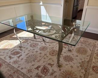 Beveled Glass Dining Table On Shaped Metal Base With Ribbon Detail