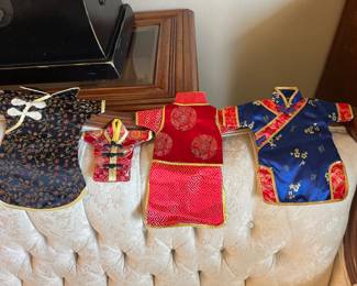 Dresses for wine or liquor bottles