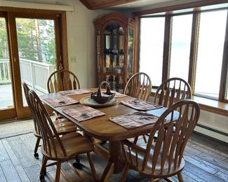 Large dining room table with six chairs