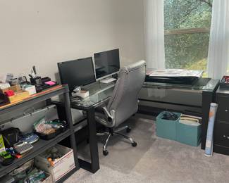 modern office furniture  sleek and classy   lots of supplies too 
