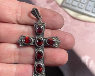 STERLING AND GARNET CROSS PENDANT 