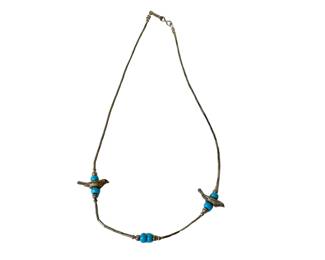 Vintage liquid silver fetish bird necklace