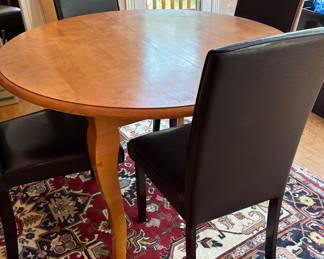 Table with leaf and 4 chairs