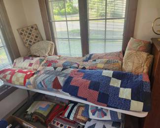 A LARGE selection of quilts from the last 100 years