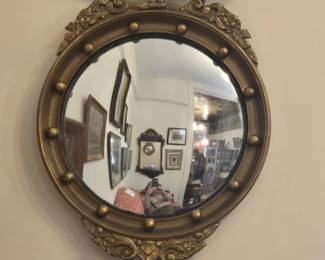 unusual diminutive convex mirror