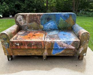 “Cat Nap” by Chicago artist Tiffany Stronsky, 2001, hand-painted fiberglass couch, part of Suite Home Chicago, an Urban Street Furniture exhibition in Chicago during the summer of 2001. “Cat Nap” was sponsored by the Drake Hotel
