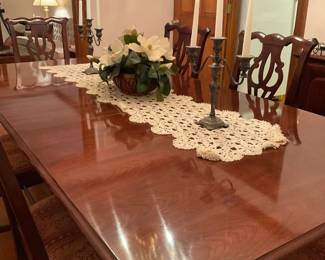 Gorgeous mahogany dining table with Chippendale-style chairs