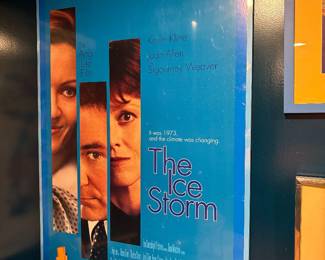 vintage movie posters, including "Pirates of the Caribbean" and "When Harry Met Sally"
