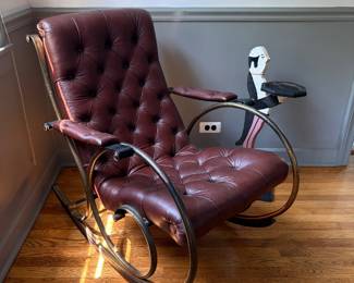 A metal frame and tufted leather rocking chair--now, I have to admit that I normally do not like rocking chairs and find them to be rather uncomfortable, but this one ROCKS! Literally, I could relax in this all day.