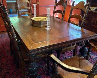 1920s Spanish Revival dining table with 6 matching ladder back chairs