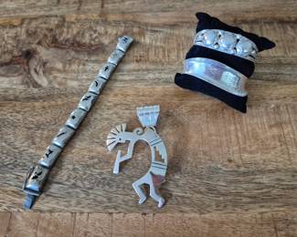 Sterling silver Native American pendant, silver cuffs and bracelet