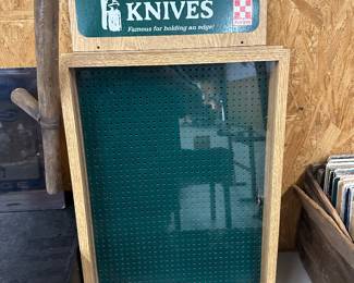 New knife display with purina advertisement