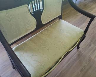 Antique Love Seat with wooden wheels