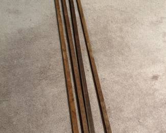 Vintage yard sticks with brass accent