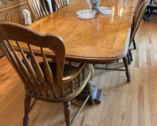 Large dining table with six chairs