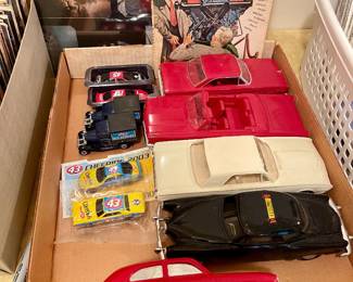 Vintage 1940’s wind up cars and salesman displays