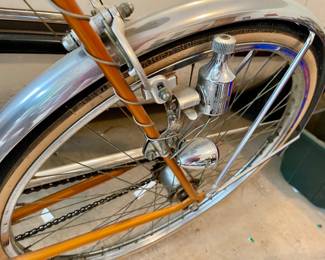 Tail light that is wheel powered