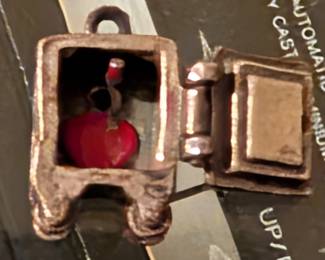 Refrigerator charm- opens to reveal a greata