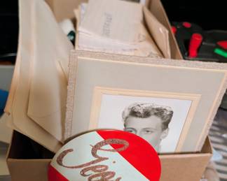 Boxes of love letters. Also a sealed HS crush letter... Scrapbooks for PLU and a huge HS scrapbook from the early 60s