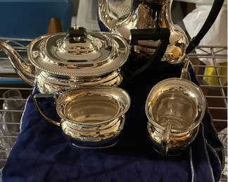 Lot 284: Shreve, Crump & Low Silver tea service set with teapot, coffee pot, sugar bowl and creamer