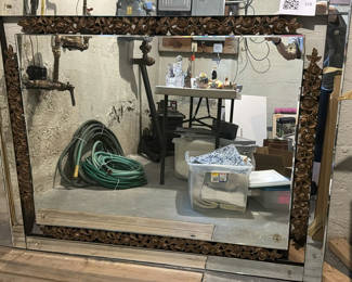 Lot 319: Ornate floral-framed wall mirror with assorted items