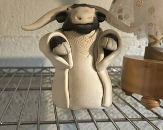 Lot 699: Decorative figurines and a vintage cartoon trinket box
