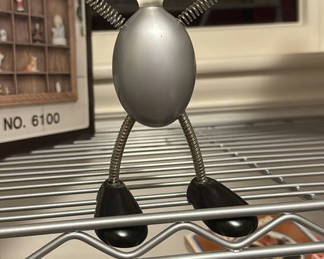 Lot 107: Assorted home and kitchen items including decorative figurines and a Crock-Pot