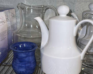 Lot 264: White ceramic teapot and glass pitcher with blue goblet