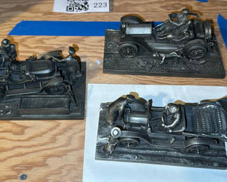 Lot 2244: Collection of 3 pewter metal automobile figurines with drivers