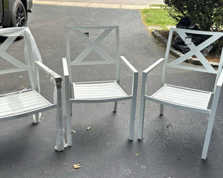 Lot 605: White Threshold Afton metal X-back chairs (4-pack) and white round folding table